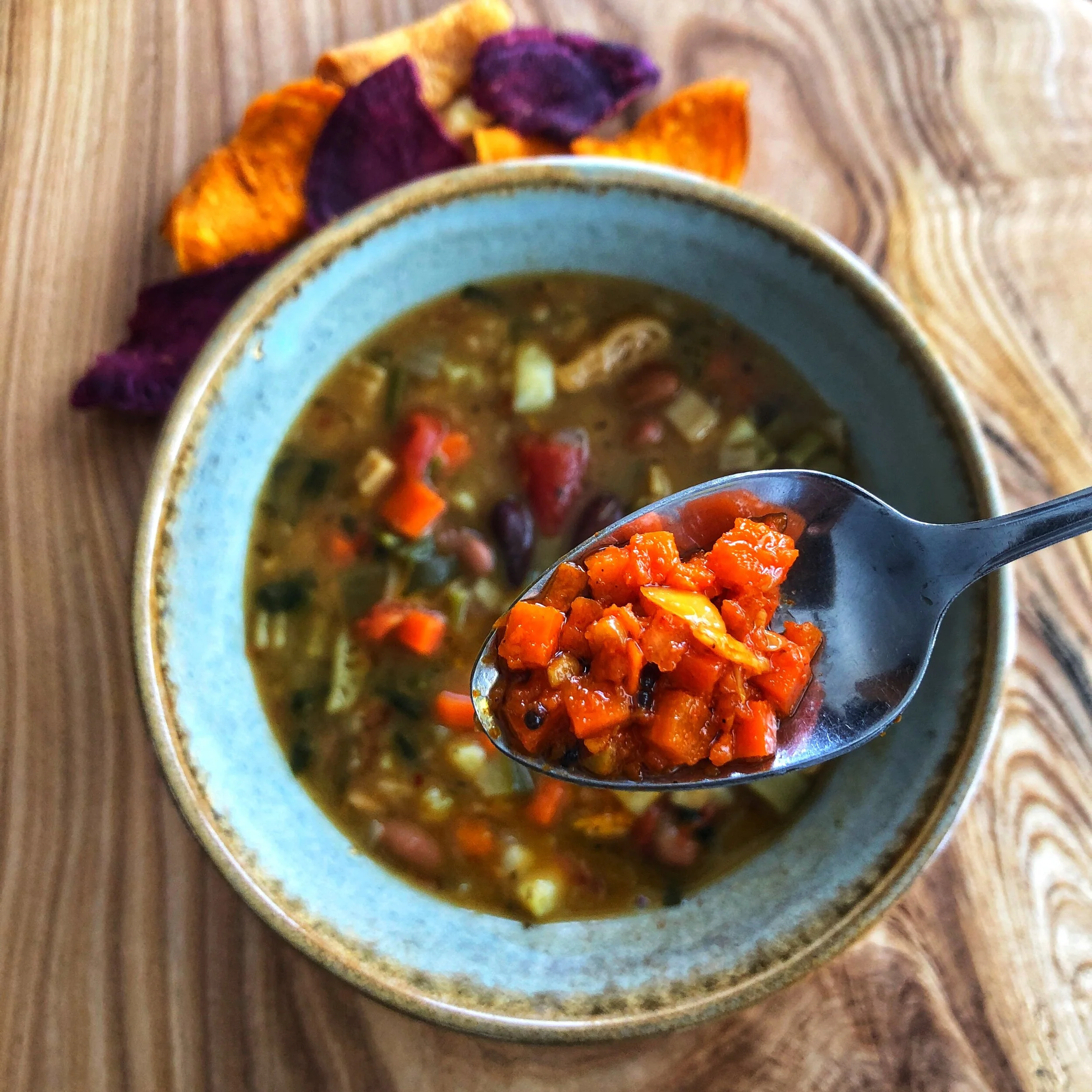 Soup garnished with Spicy Carrot Pickle